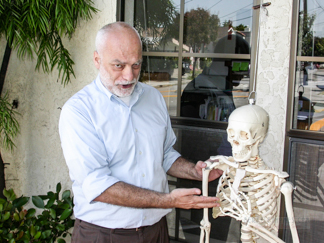 Dr. Robert Ammirati, Chiropractor & skeleton